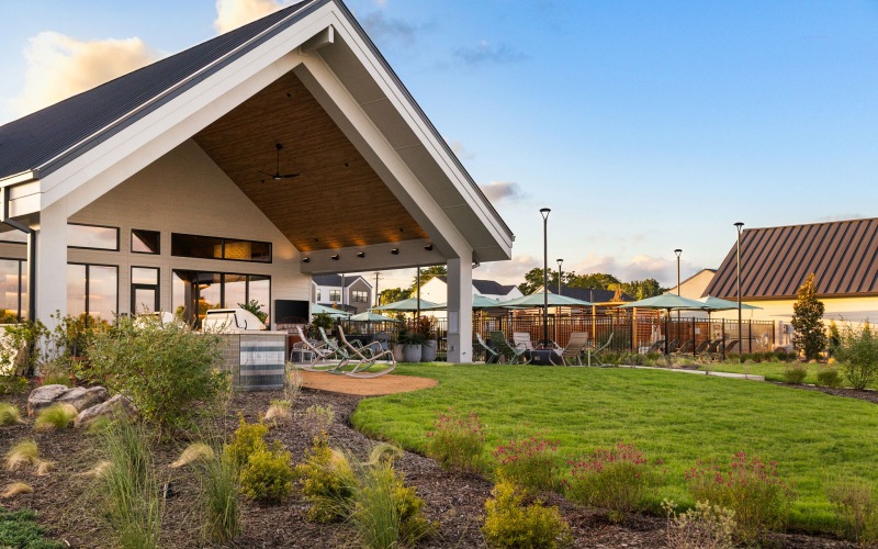 large lawn in front of the community clubhouse for residents of a rental community in Rowlett