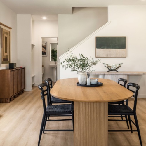 an open kitchen and large dining table of a rental townhome 