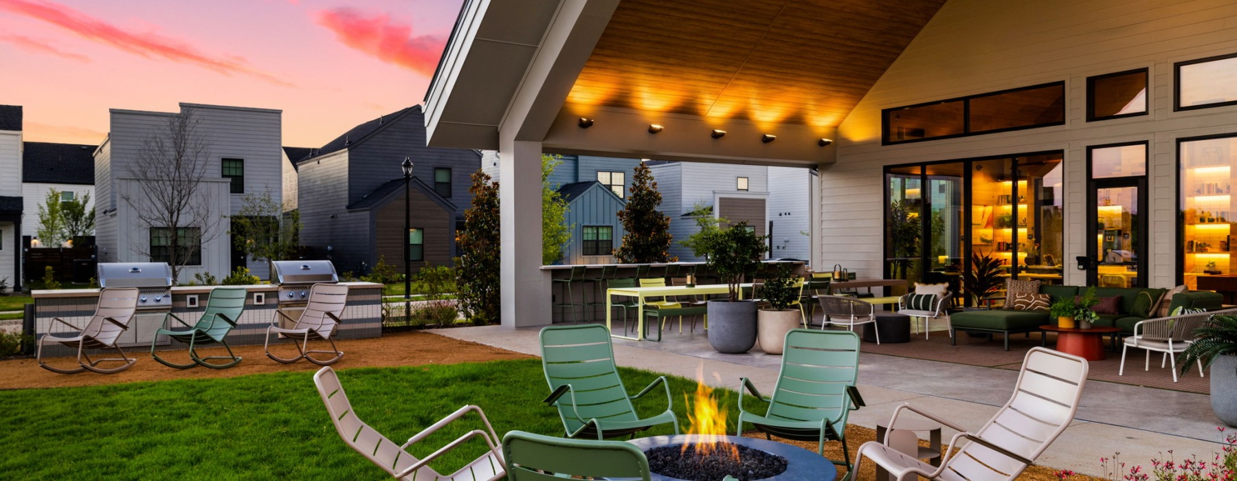 fire pit next to an outdoor living room  for residents of a BTR rental community