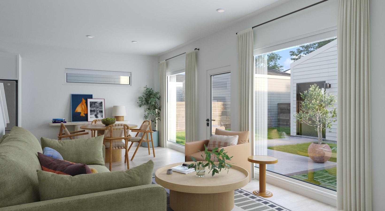 Wide open living areas flooded with natural light a living room with a large glass door