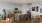 a kitchen with a bar stool and a table