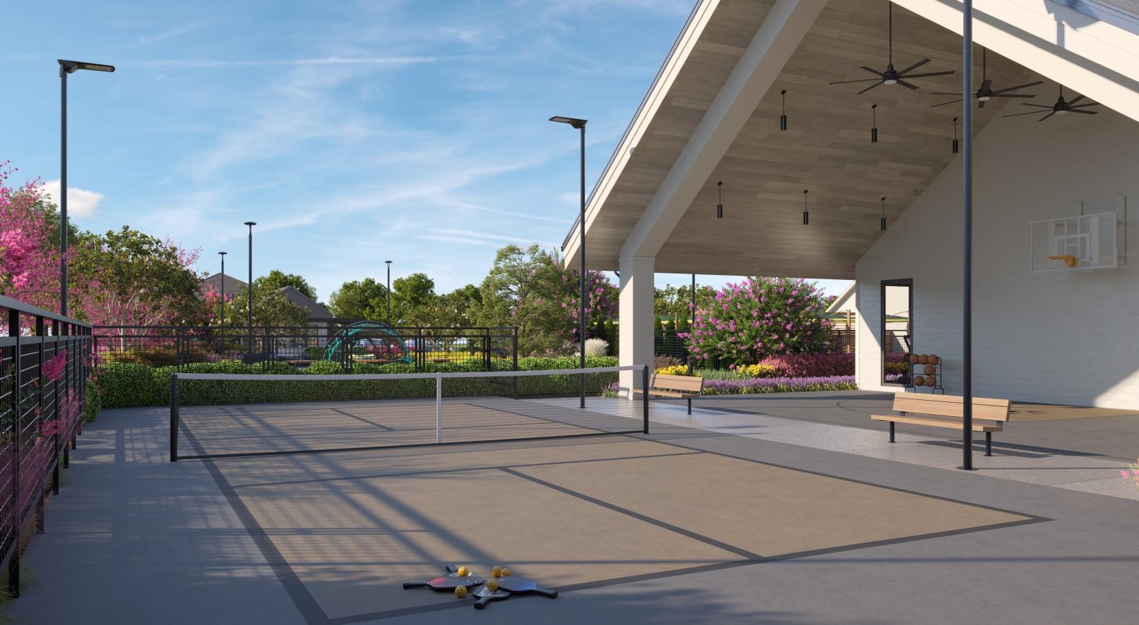 State-of-the-art amenities a tennis court with paddles and balls