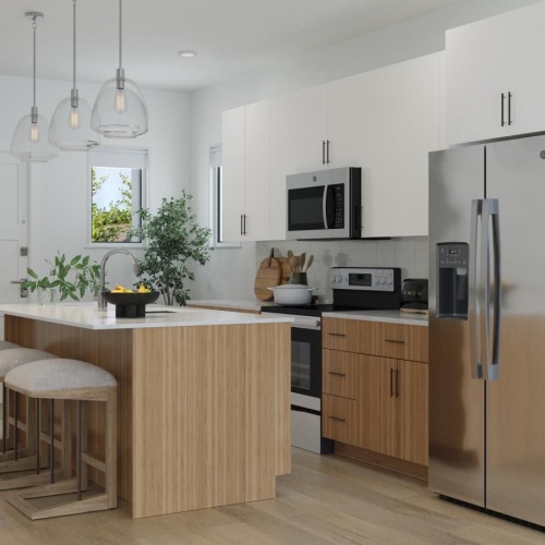 a kitchen with white cabinets