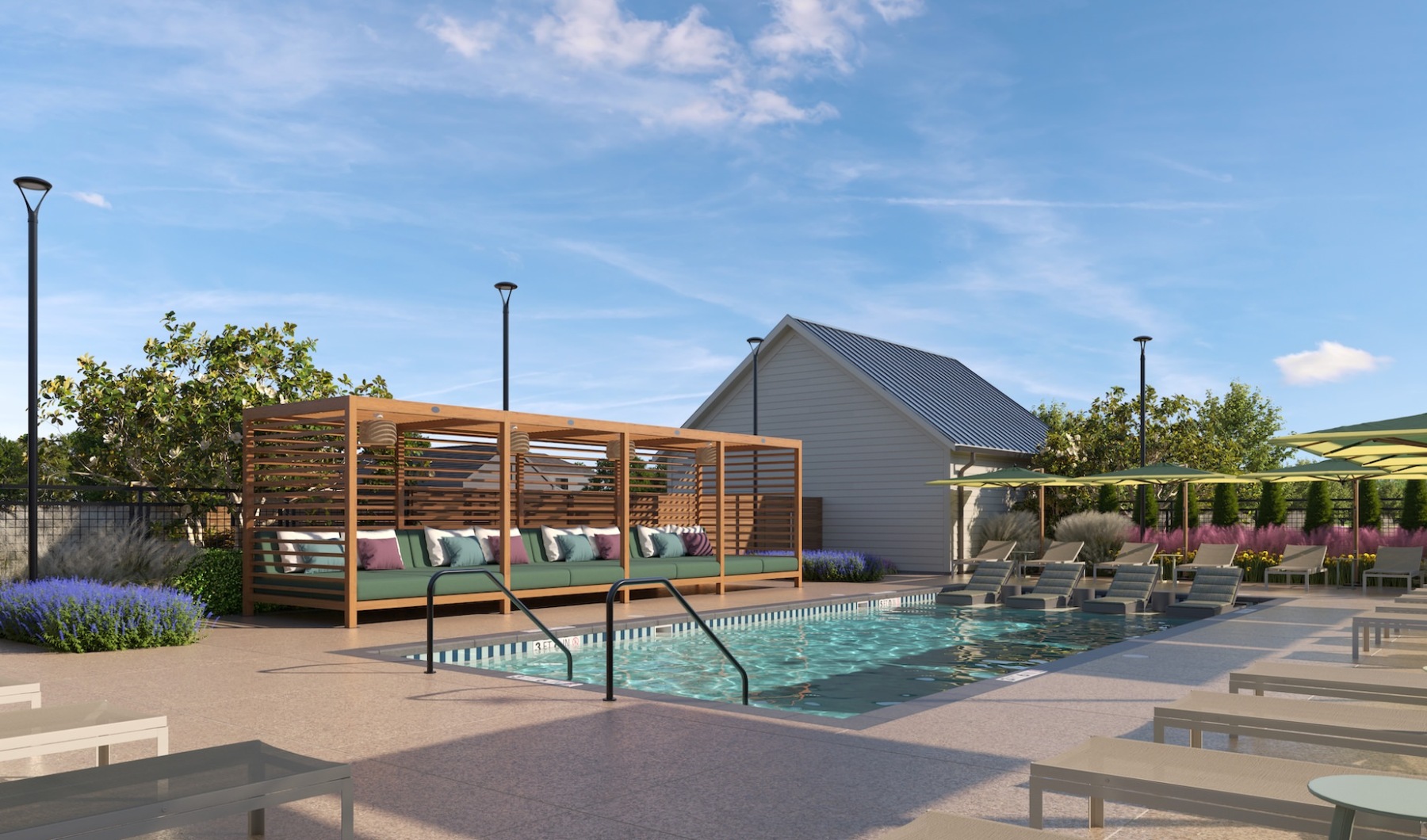 Inspiring outdoor spaces as an extension of your home. a swimming pool with cabanas and lounge chairs