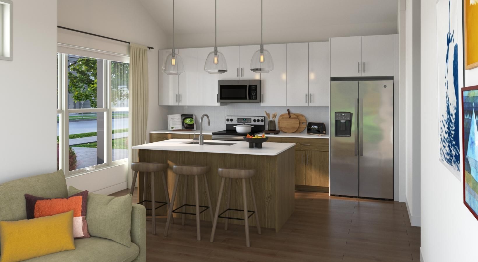 Wide open living areas perfect for entertaining a kitchen with a table and chairs