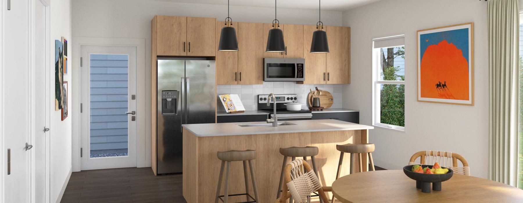 a kitchen with a dining table and a refrigerator