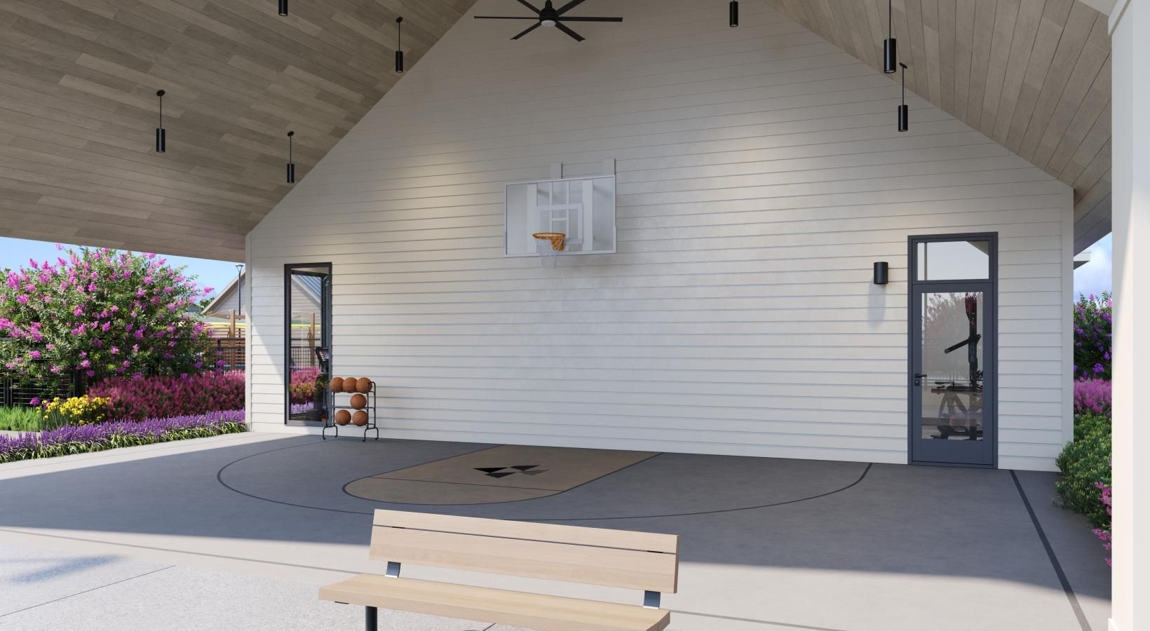 Cutting-edge amenities at your fingertips a bench sits in front of a basketball court