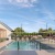 a swimming pool outside of a building