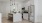 a kitchen with white cabinets