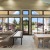a clubhouse room with a table and chairs