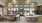 a clubhouse room with a table and chairs