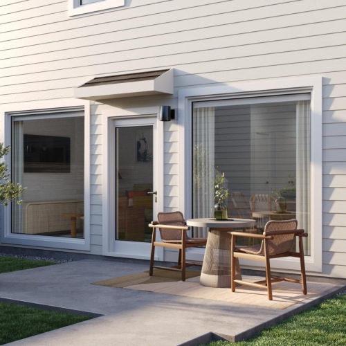 a house with a patio and a table and chairs